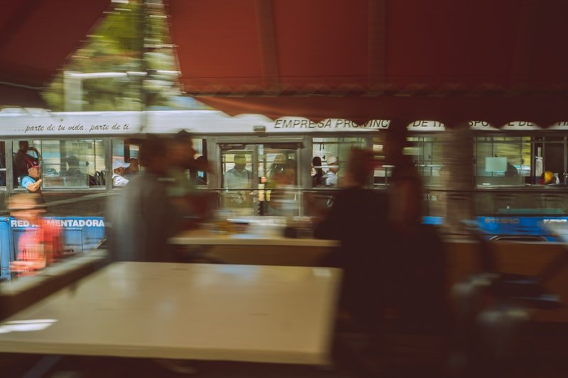 people standing in front of store during night time