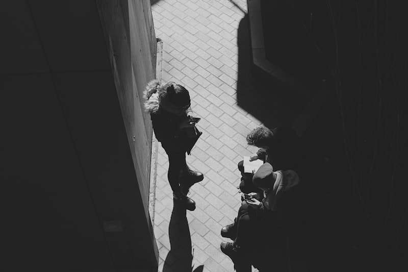 a couple of people standing next to each other