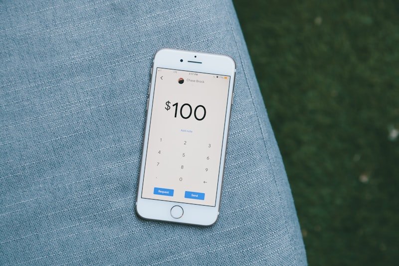 white samsung android smartphone on gray textile