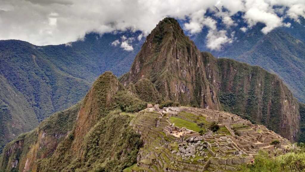 Breathtaking aerial view of Machu Picchu, nestled in the Andes Mountains of Peru, a top tourist destination.