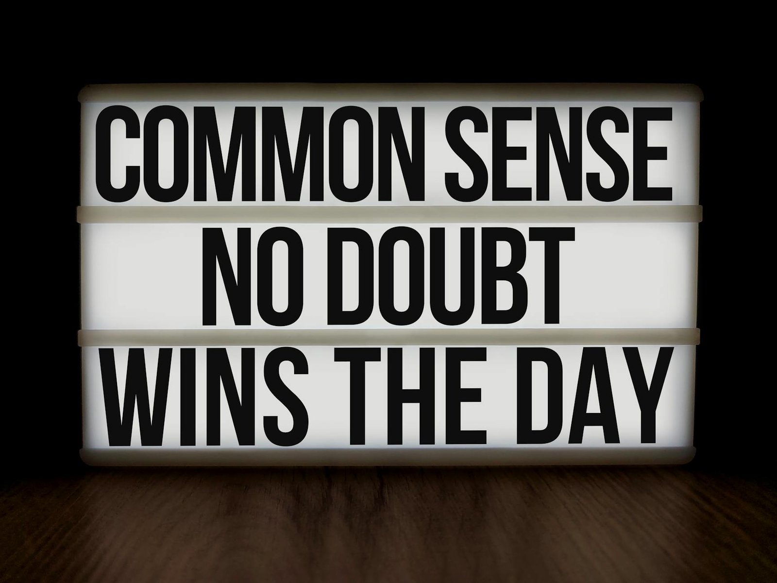 Lightbox with message: 'Common Sense No Doubt Wins the Day'.
