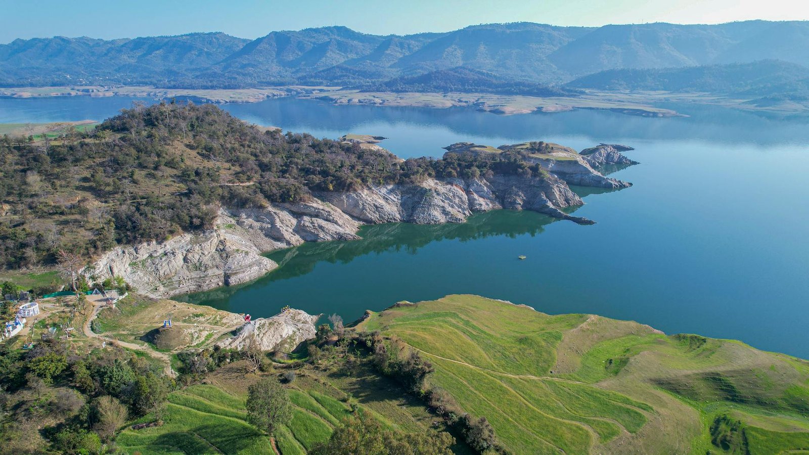 Spectacular aerial view of Una Lake and surrounding hills, Himachal Pradesh, India.