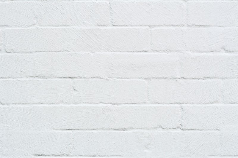 white concrete wall during daytime