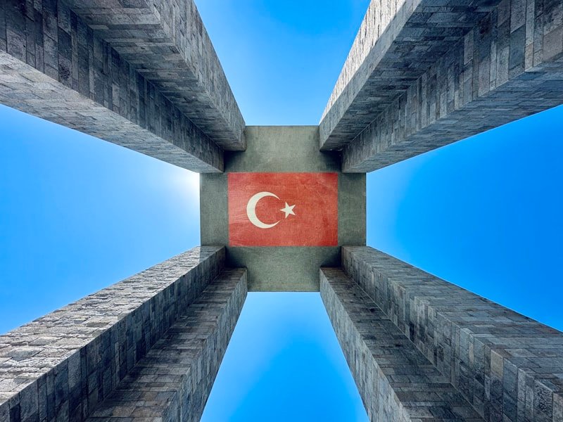 A picture of a turkey flag in the middle of a building