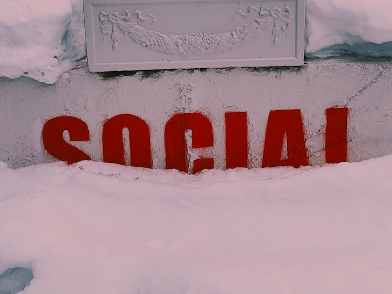 red and white love print on white wall